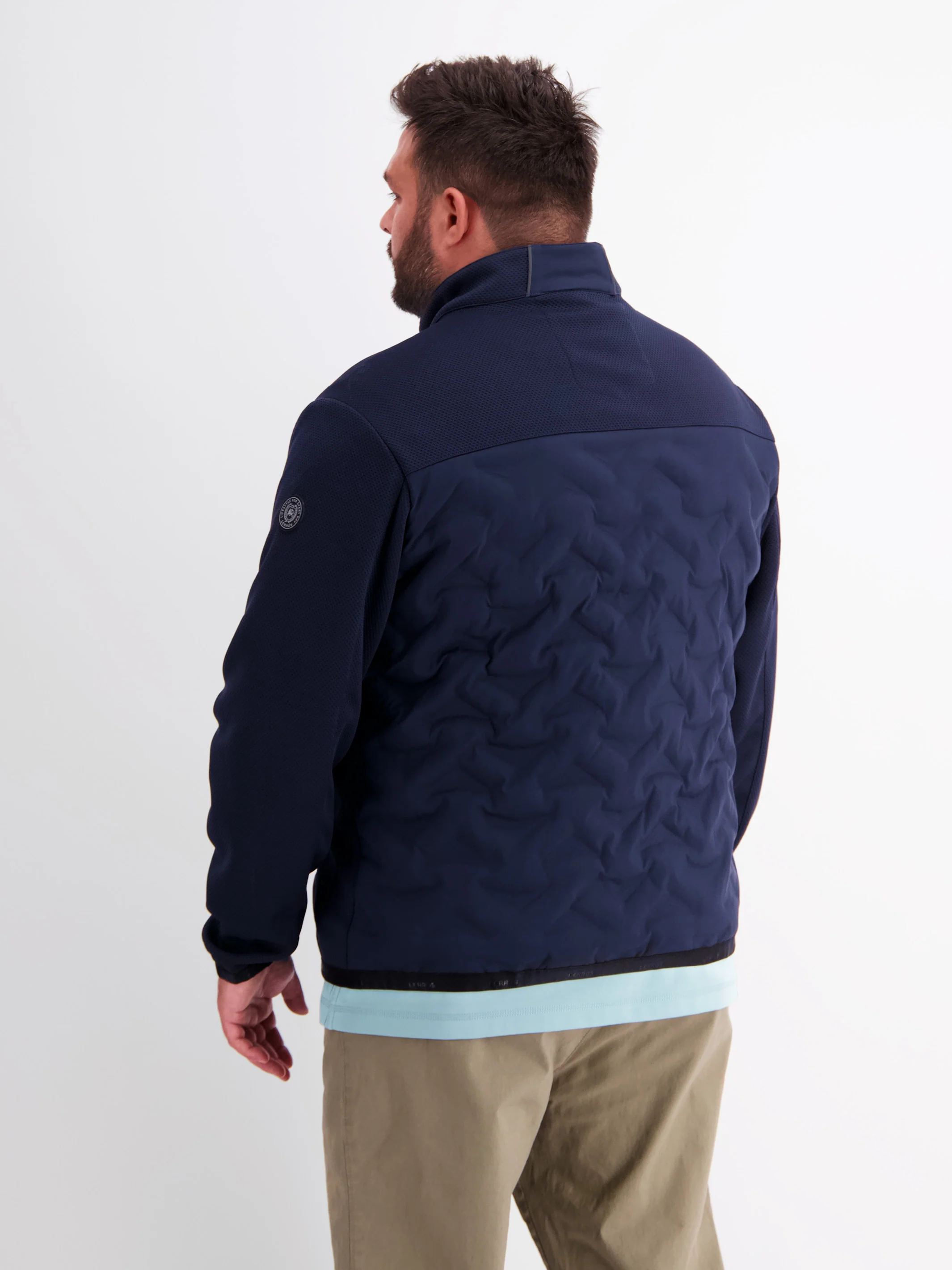 Sportliche Hybrid-Jacke - Image 9